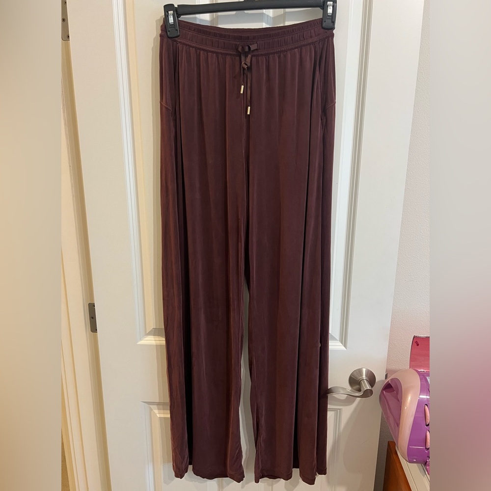 Lululemon burgundy with gold detail wide leg drawstring pant.